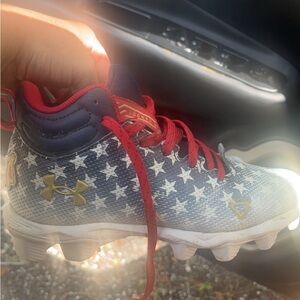 Youth size 2 Under Armor Baseball Cleats. Worn for one season and outgrown